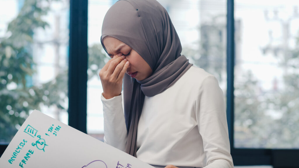 Asia muslim lady drawing work plan think information reminder on