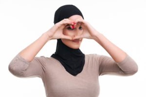 Muslim woman over white background